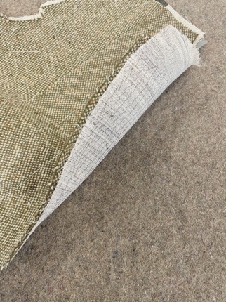The lapel being pad-stitched to build the roll.