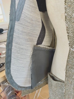 The pocket from the inside, with the canvas supporting the front edge.